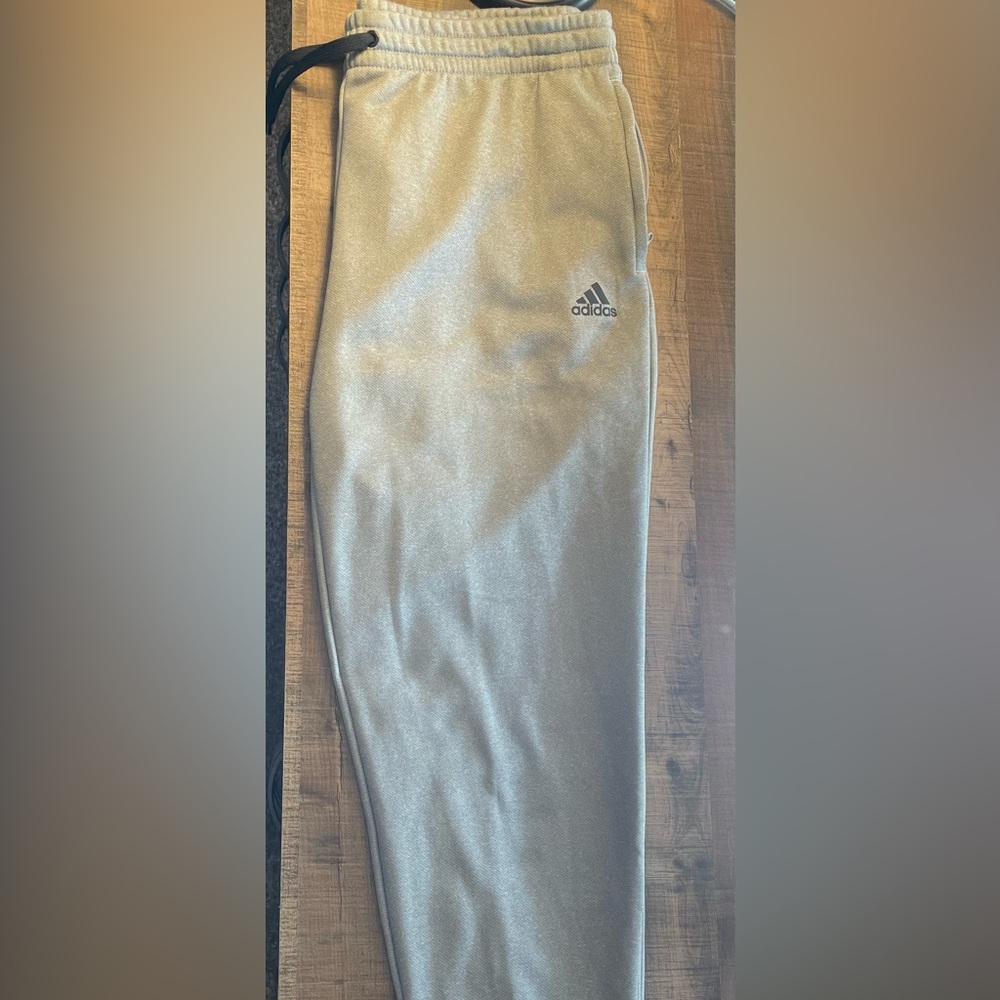 Adidas gray sweatpants with zipper side pockets